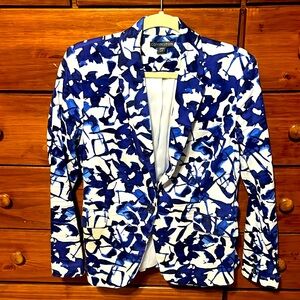 Pockets. Stain on right pocket